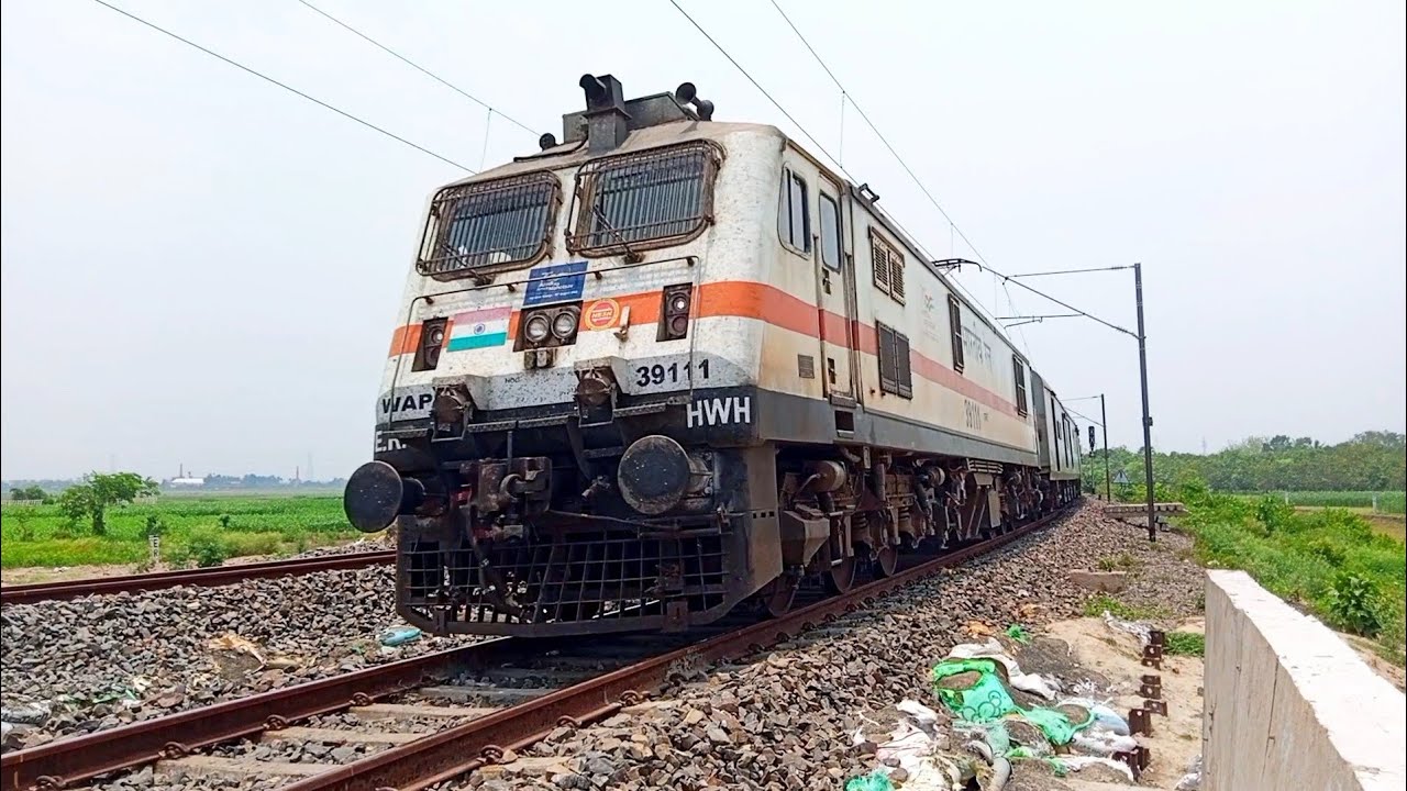 Kamrup express with WAP7 lid LHB coach.... YouTube