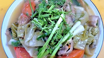 Cá chép om dưa cải chua của bà Tám .