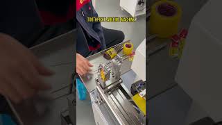 Fold-over labeling machine