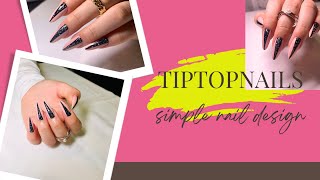 Edgy Elegance: Light Pink Nails Featuring Black Glitter Triangles