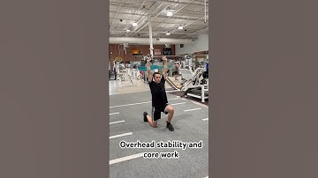 Walking Overhead Lunges with Water Bag | Core & Stability Training