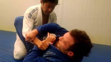 Closed guard - Attacks - Wrist lock, over hook cross choke