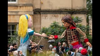 Little Amal meets Alice at Oxford Botanic Garden