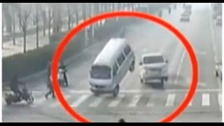 Unbelievable CCTV of 'levitating' car crash goes viral online :: Chinese surveillance video 2015