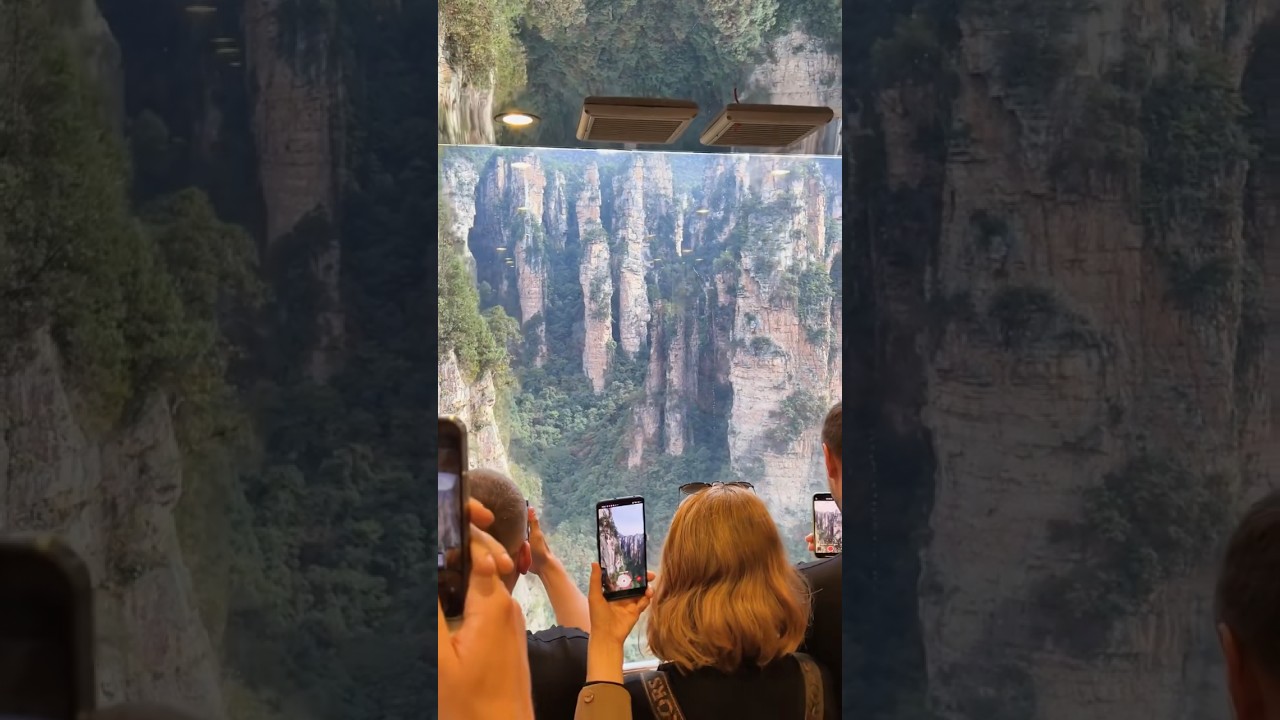 a glass double-deck elevator in Zhangjiajie