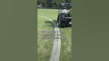 GPS line marking a 60 foot soccer circle right next to a hand-painted one. #turf #gps #linemarking ￼