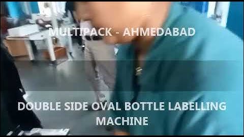OVAL BOTTLE DOUBLE SIDE STICKER LABELING MACHINE #stickerlabelingmachine #labelingmachine
