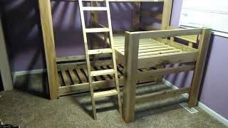 Made a triple bunk bed for grils with used wood.