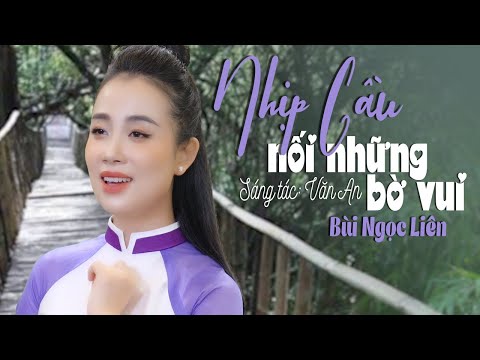 Watch Nhịp Cầu Nối Những Bờ Vui - Ngọc Liên | MV OFFICIAL on YouTube
