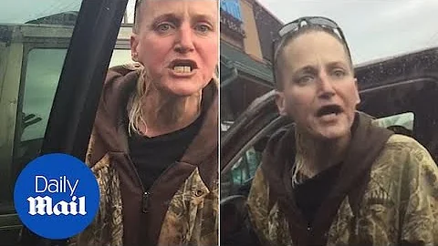 Racist woman threatens to STAB a man over a crooked PARKING!