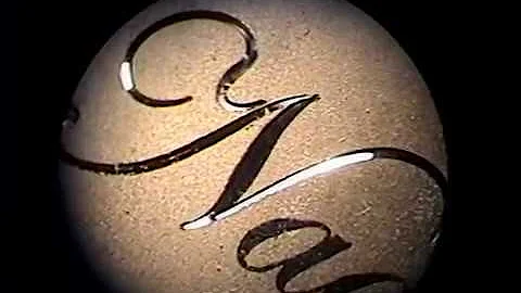 Bright cut engraving & lettering a gold flute - St...