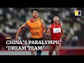 Blind Chinese runner and guide form dream team to smash Paralympic record and take gold in Tokyo