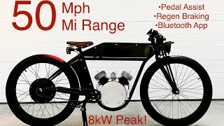 An Electric Motorcycle W Pedals - The Etracker From Mad Moto Inc - Best Ebike Of 2023
