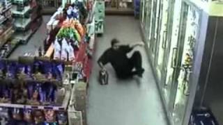 Drunk Guy Falling Over In Convenience Store