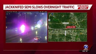 Jackknifed semi slows I-80