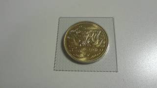 10万円金貨（天皇陛下御在位六十年記念硬貨）