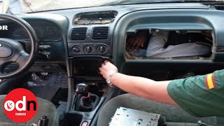 Migrant tries to smuggle himself in car glove compartment!