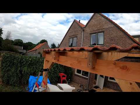 Video: Kun je een betonnen veranda met hout bedekken?
