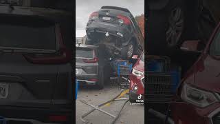Walmart Parking Lot Car Crash: SUV Lands Atop Another Vehicle#CarCrash