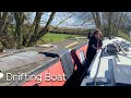 70. Drifting boat on the Oxford Canal & oak doors