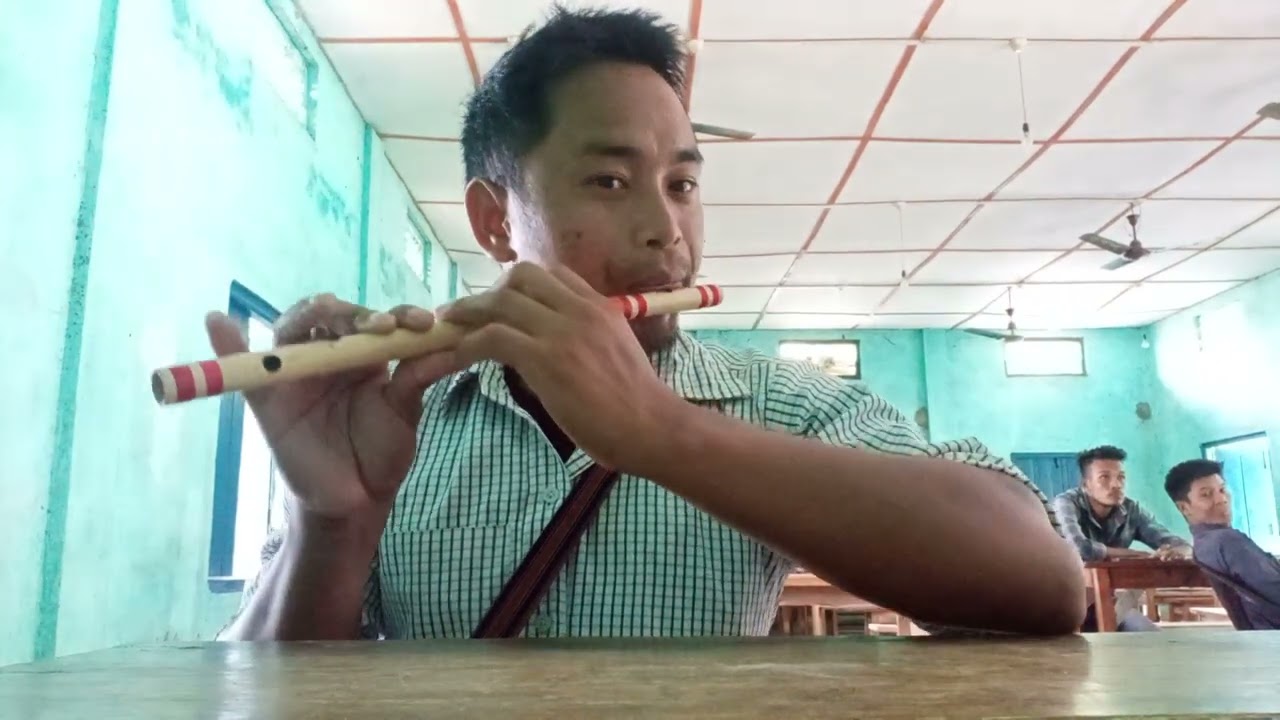 The karbi folk song playing with flute 