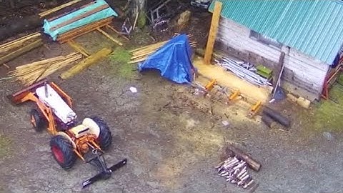 Milling log on tmg psm26 sawmill with 1965 case 430 tractor.