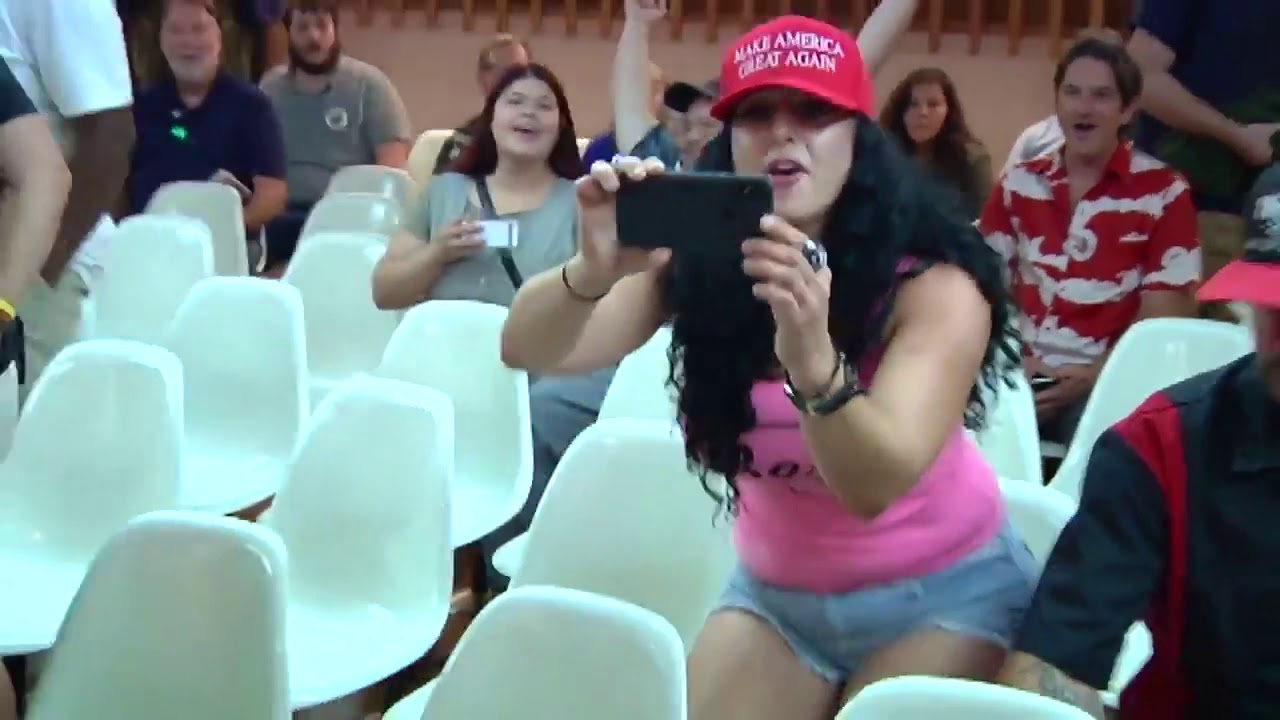 Green Shirt Guy laughs at trump supporters