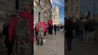 Tourists line up to take pictures with the Red Phone Box #shorts