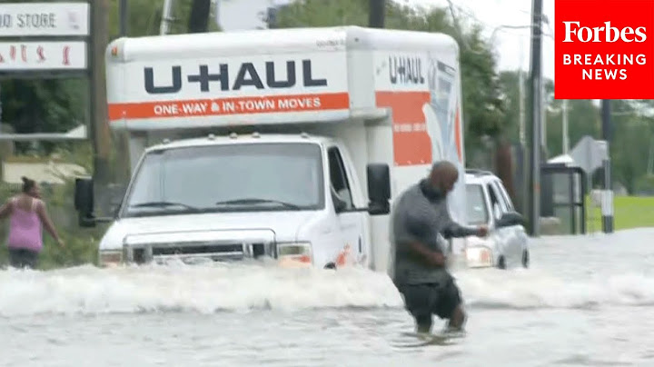 Flooding From Hurricane Beryl Makes Roadways Nearly Impassable For Pedestrians And Motorists