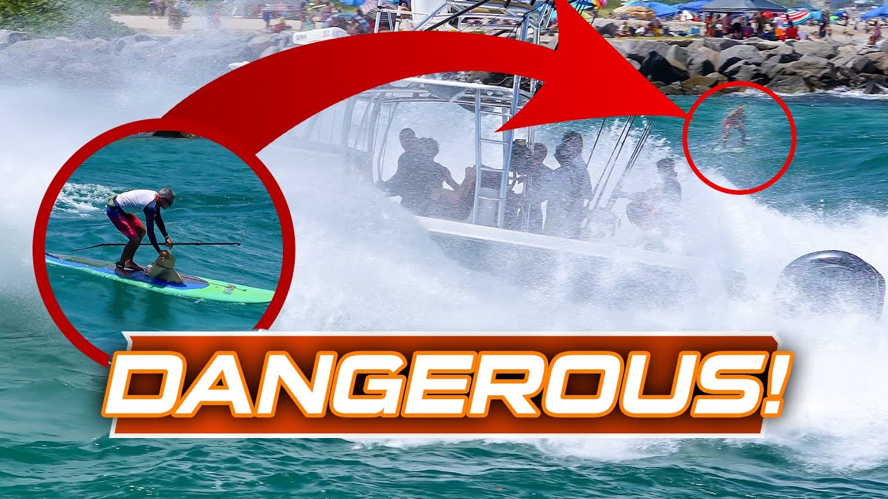 Risking his life in the middle! BIG WAVES at HAULOVER INLET!