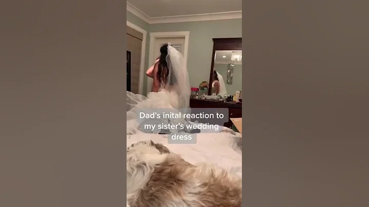 Dad's reaction to seeing his daughter in wedding dress