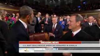 American hostage in Somalia rescued by US Navy SEALs in overnight raid.