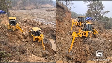 two jcb 3dx super digging foundation for constructing a bridge