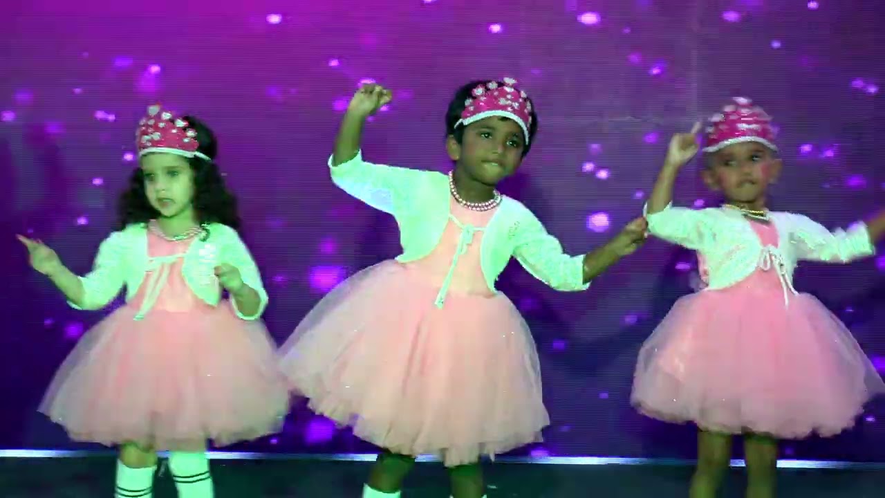 A catchy, cheerful carnival tune begins, Our play group childrens for their amazing performance