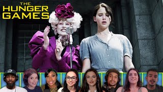 Reactors Reactions to KATNISS EVERDEEN VOLUNTEERS AS TRIBUTE | The Hunger Games (2012)