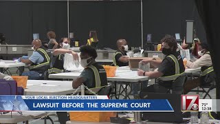 Lawsuit on absentee ballots brought before Supreme Court