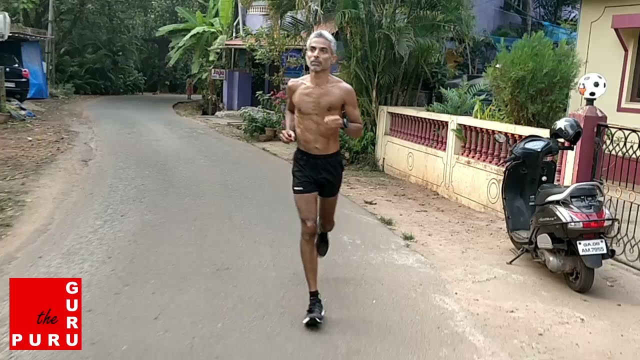 Puru The Guru runs through a South Goan Fishing Village