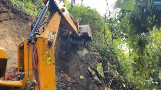 Giving Road Shape Cutting Rocky Hillside with JCB Backhoe Loader