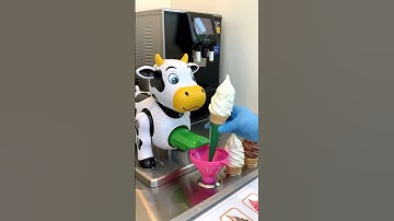 🐄🤖 Moo-ving Ice Cream! Watch This Robot Cow Serve!
