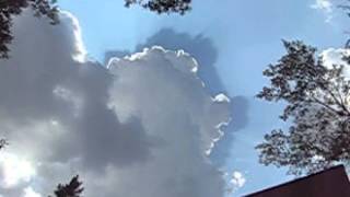 Cloud casting its shadow in the sky above it - Edmonton Canada