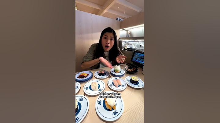 Eating at World's BIGGEST Conveyor Belt Sushi Train