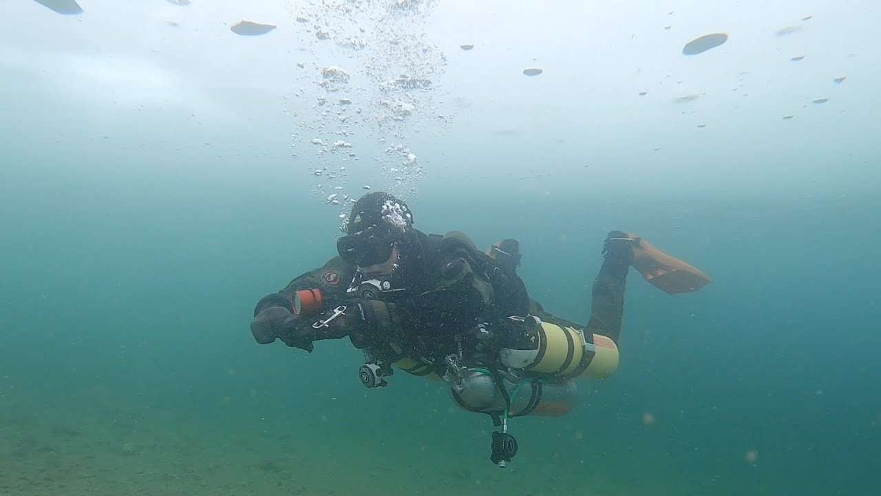 Ice diving at Kaatiala mine Finland.