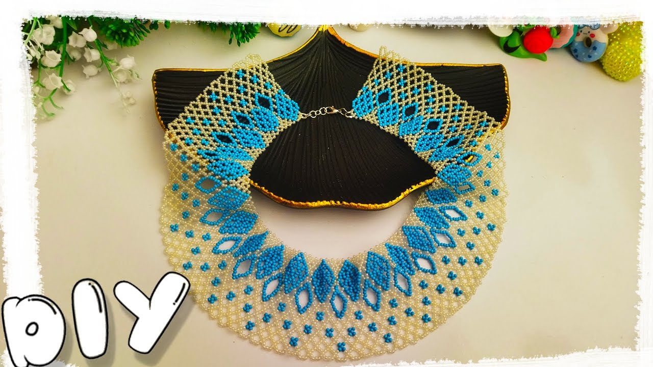 WIDE BEADED NECKLACE. BEADING