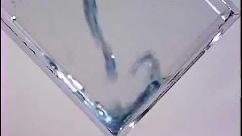 Real World Mathematical Modeling: Water poured in tilted container 1