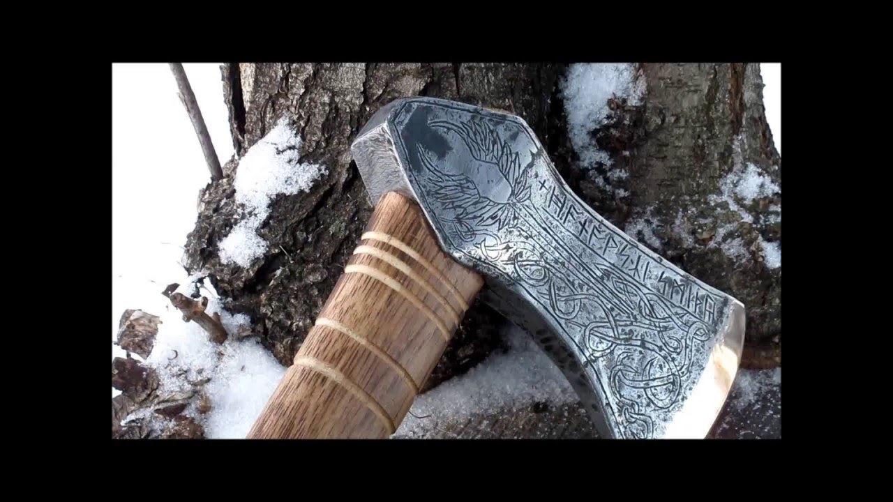 re-forging an old wood axe into an engraved viking axe
