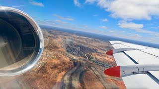 QantasLink Fokker 100 takeoff from Kalgoorlie over the Super Pit