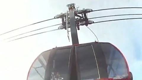 Watch harrowing BASE jump out of gondola
