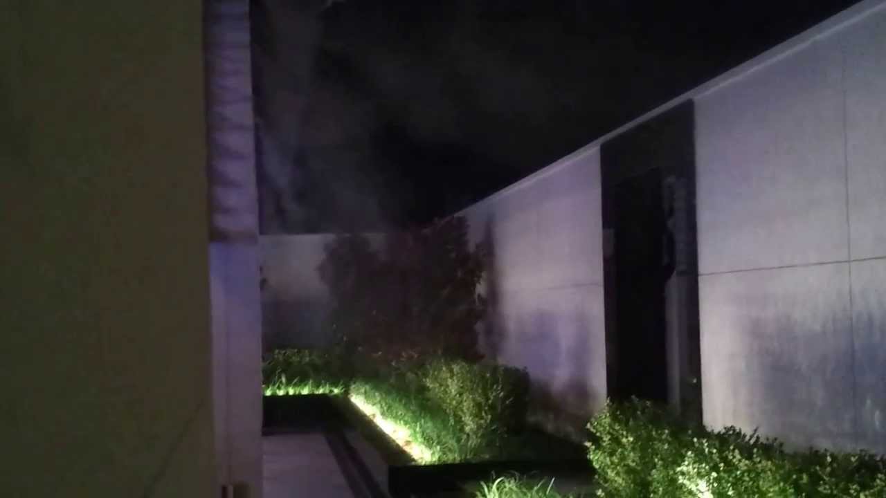 A fixed line system at night featuring a garden courtyard