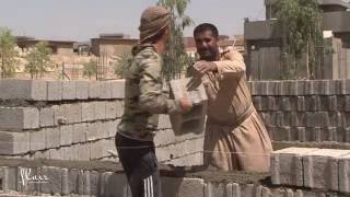 Iraq, Salah Al-Din | Residents build a health center in Tuz Khurmatu.