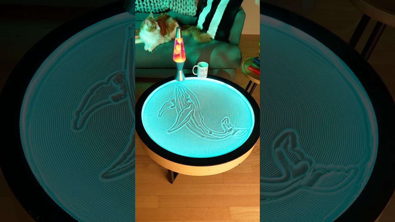 Watch the Oasis Coffee Table sketch a whale in flowing sand, bringing the deep sea to your space.